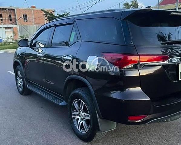 Bán ô tô Toyota Fortuner 2.4G 4x2 AT năm 2018, màu đen, xe nhập còn mới0