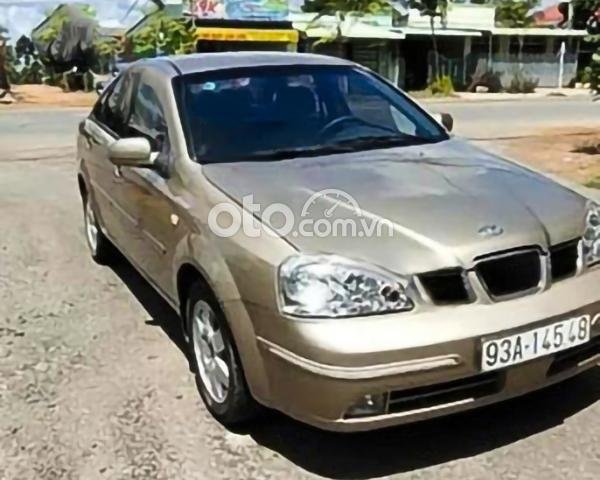 Cần bán Daewoo Lacetti Max 1.8 MT sản xuất 2005, màu vàng cát0