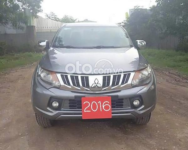 Xe Mitsubishi Triton 4x2 AT sản xuất năm 2016, màu xám, xe nhập ít sử dụng