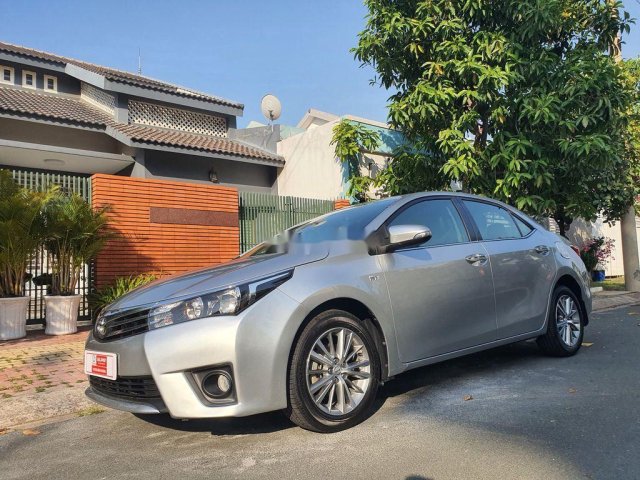 Xe Toyota Corolla Altis đời 2015, màu bạc