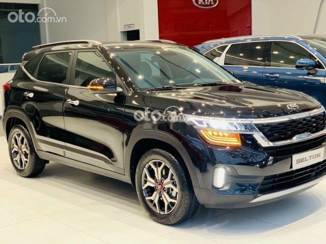 Bán Kia Seltos 1.6 Premium năm sản xuất 2021, màu đen, giá chỉ 709 triệu0