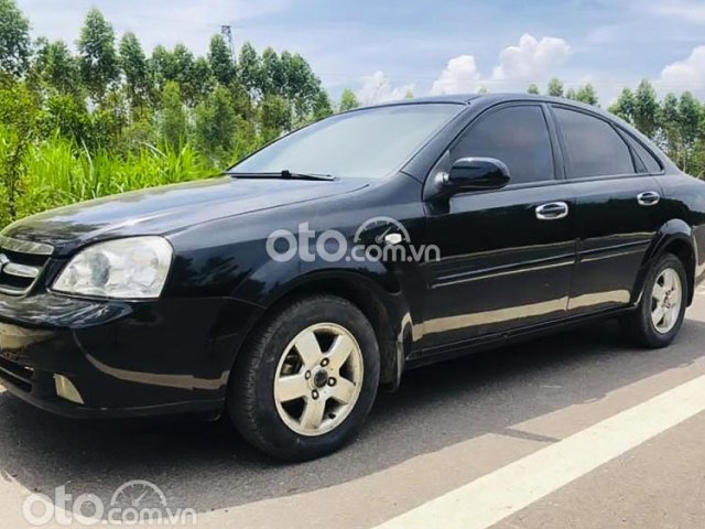 Cần bán lại xe Daewoo Lacetti EX năm sản xuất 2011, màu đen0