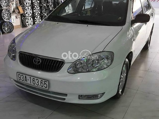 Cần bán lại xe Toyota Corolla J 1.3 MT sản xuất 2002, màu trắng như mới0