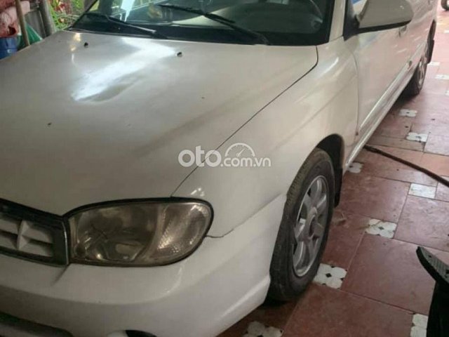 Bán Kia Spectra 1.6 MT năm 2004, màu trắng giá cạnh tranh0