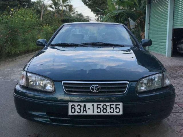 Cần bán Toyota Camry năm sản xuất 1999, màu đen xe gia đình0