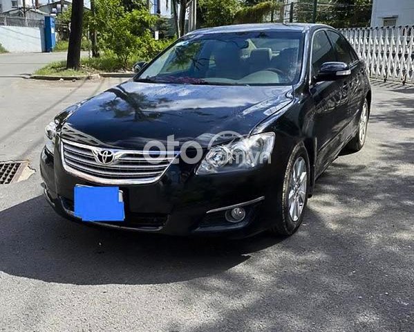 Cần bán gấp Toyota Camry 2.4G đời 2007, màu đen  0