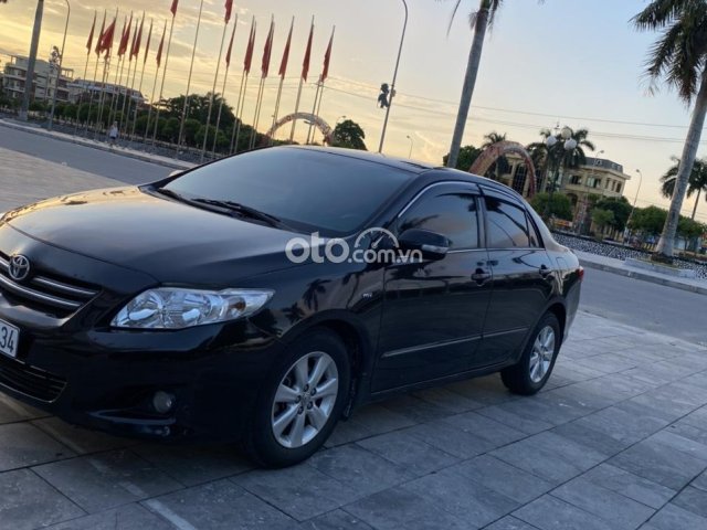 Cần bán lại xe Toyota Corolla Altis năm 2010 - màu đen còn rất mới0