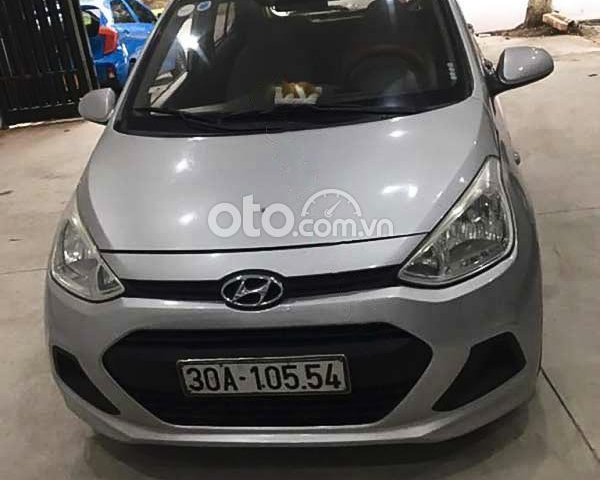 Cần bán lại xe Hyundai Grand i10 1.0 MT Base năm sản xuất 2014, màu bạc, nhập khẩu nguyên chiếc0