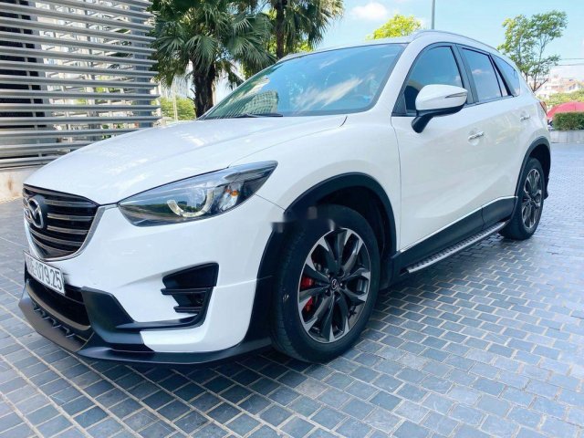 Cần bán gấp Mazda CX 5 đời 2016, màu trắng, 665 triệu0