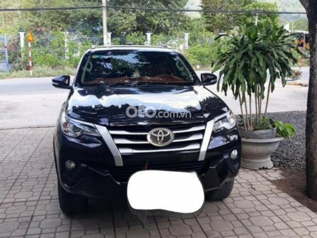 Bán ô tô Toyota Fortuner 2.4G 4x2 MT đời 2017, màu đen, nhập khẩu số sàn, giá 720tr0