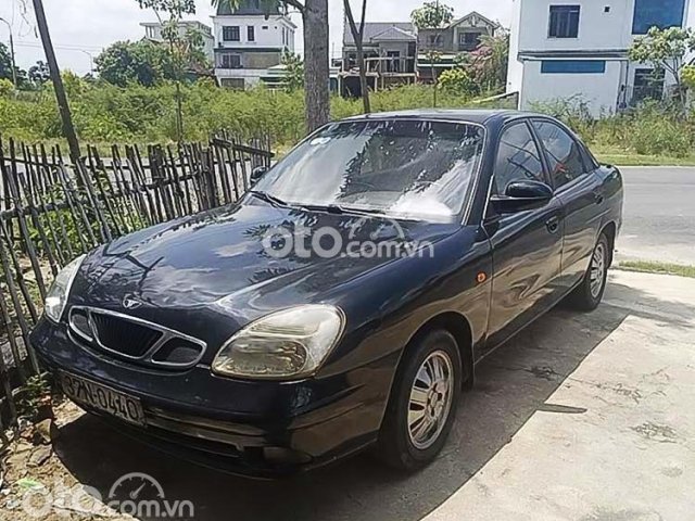 Cần bán Daewoo Nubira sản xuất 2004, màu đen giá cạnh tranh0