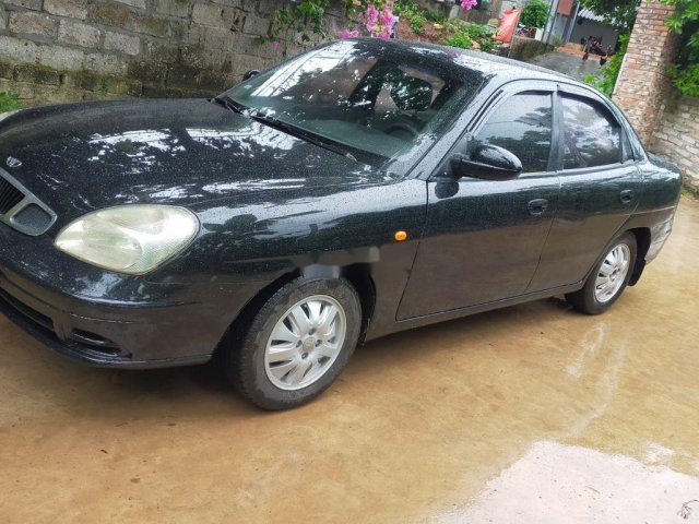 Cần bán lại xe Daewoo Nubira sản xuất 2003, màu đen, xe nhập giá cạnh tranh0