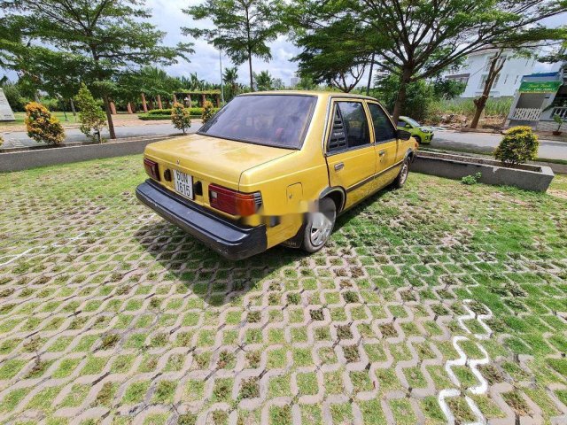 Cần bán Nissan Sunny 1982, màu vàng, nhập khẩu0