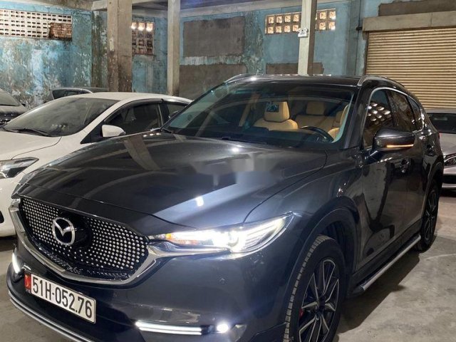 Cần bán gấp Mazda CX 5 đời 2019, màu xanh lam  0