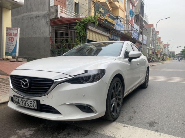 Cần bán gấp Mazda 6 2.0 Premium năm sản xuất 2019, màu trắng chính chủ0