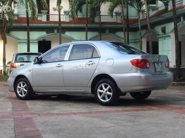 Cần bán gấp Toyota Corolla J 1.3 MT đời 2003, màu bạc chính chủ, 125tr0