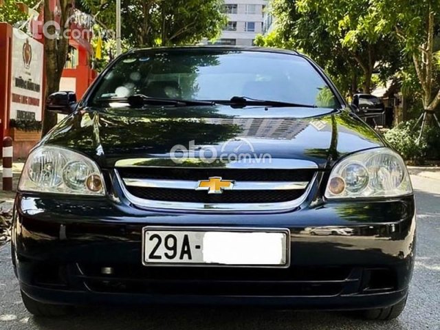 Cần bán xe Daewoo Lacetti EX 1.6MT đời 2011, màu đen0