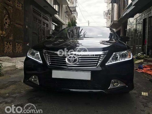 Bán ô tô Toyota Camry 2.0 E sản xuất 2014, màu đen giá cạnh tranh0