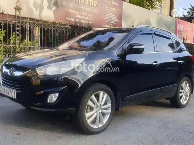 Cần bán Hyundai Tucson 2.0 AT 4WD năm sản xuất 2012, màu đen, nhập khẩu nguyên chiếc còn mới