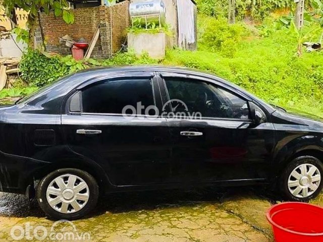 Cần bán lại xe Daewoo Gentra SX 1.5 MT năm sản xuất 2009, màu đen còn mới, giá 128tr0