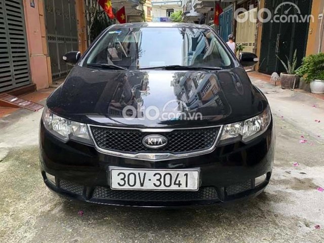 Cần bán Kia Forte SLi 1.6 AT sản xuất 2009, màu đen, nhập khẩu nguyên chiếc, giá tốt0