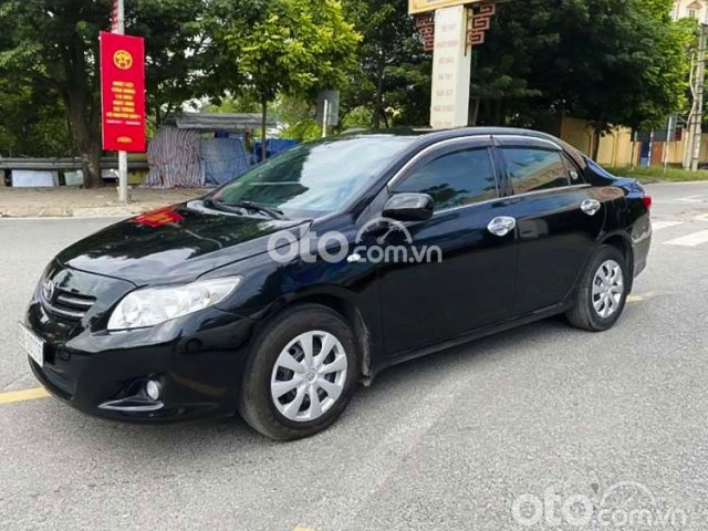 Cần bán xe Toyota Corolla XLi 1.6 AT sản xuất 2009, màu đen, xe nhập  0