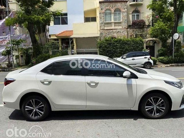 Bán Toyota Corolla Altis 1.8G AT sản xuất năm 2019, màu trắng, giá tốt0