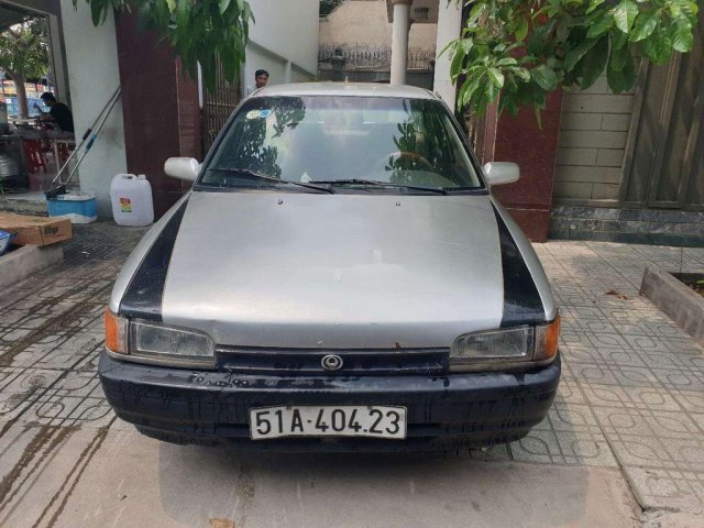 Cần bán lại xe Mazda 323 đời 1995, hai màu trắng xám