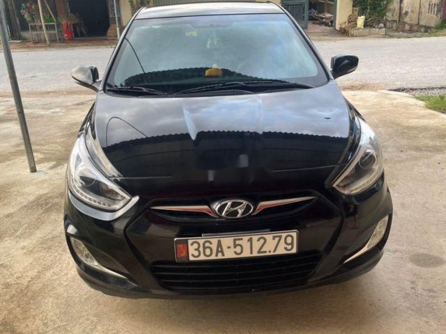 Cần bán Hyundai Accent đời 2014, màu đen0