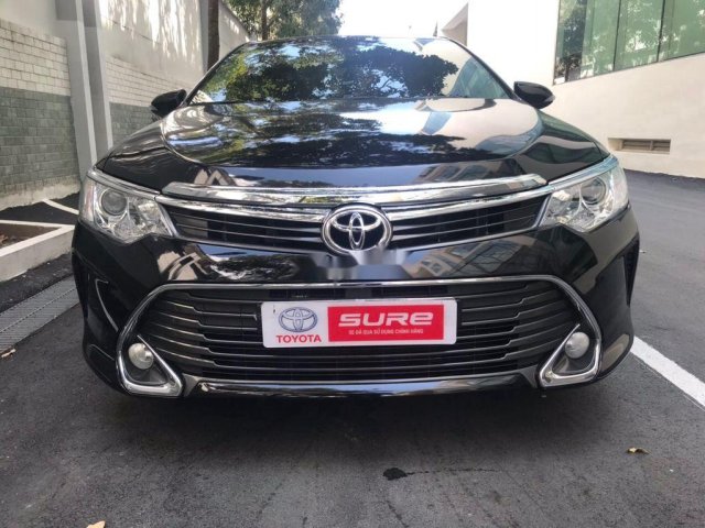 Bán xe Toyota Camry 2.0E AT 2015, màu đen, 710 triệu0