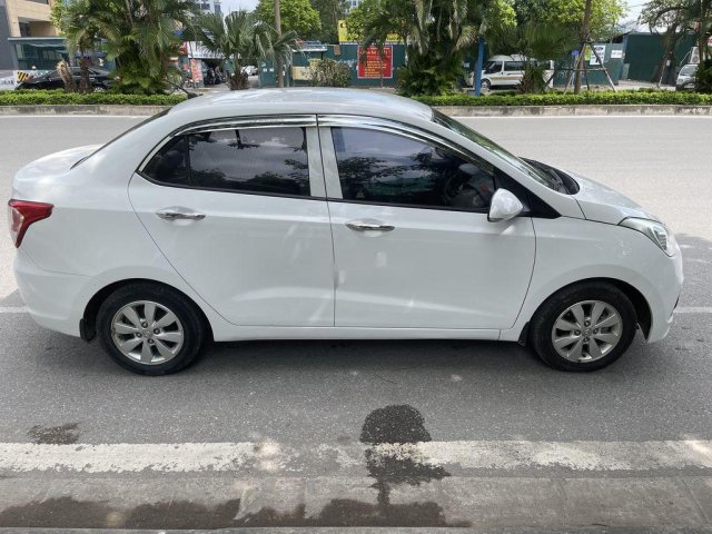 Cần bán xe Hyundai Grand i10 năm 2015, màu trắng, xe nhập  0