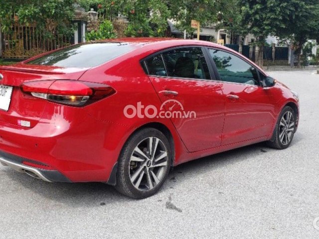 Cần bán gấp Kia Cerato 1.6 AT năm sản xuất 2018, màu đỏ  0