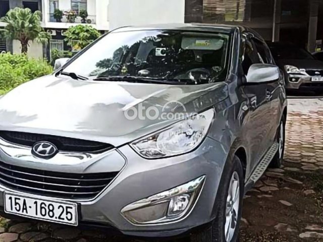 Cần bán lại xe Hyundai Tucson năm 2010, màu bạc, xe nhập0