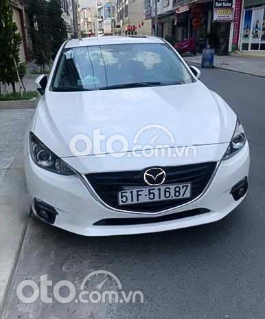 Cần bán gấp Mazda 3 2015, màu trắng giá cạnh tranh0