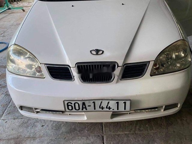 Cần bán gấp Daewoo Lacetti 2004, màu trắng 0