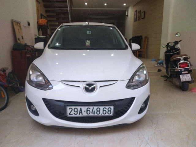 Bán ô tô Mazda 2 2016, màu trắng chính chủ, giá 298tr0