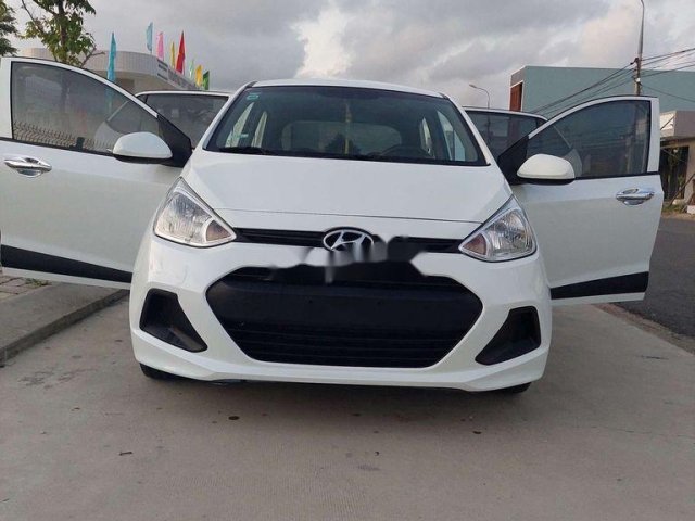 Cần bán xe Hyundai Grand i10 năm 2015, màu trắng, nhập khẩu nguyên chiếc0