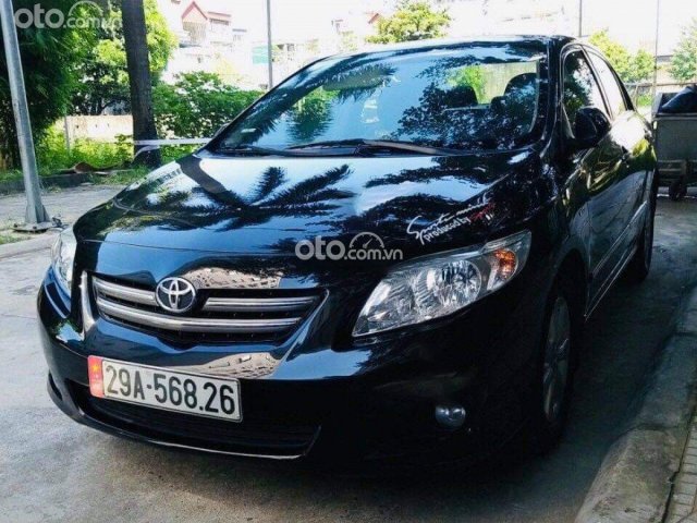 Bán xe Toyota Corolla Altis đời 2010, màu đen còn mới0