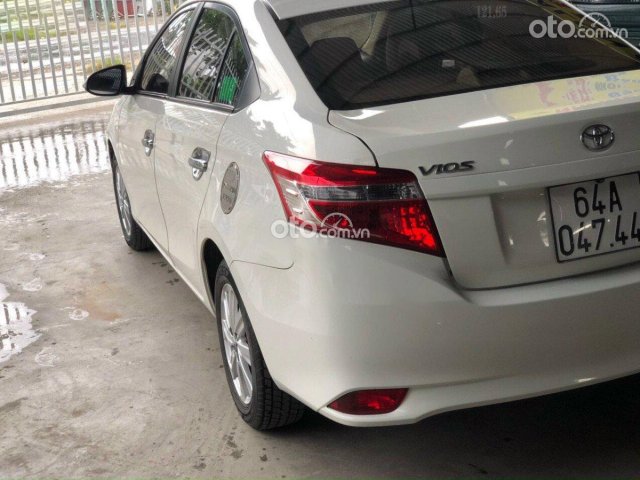 Cần bán gấp Toyota Vios 1.5E CVT đời 2017, màu trắng số tự động giá cạnh tranh0