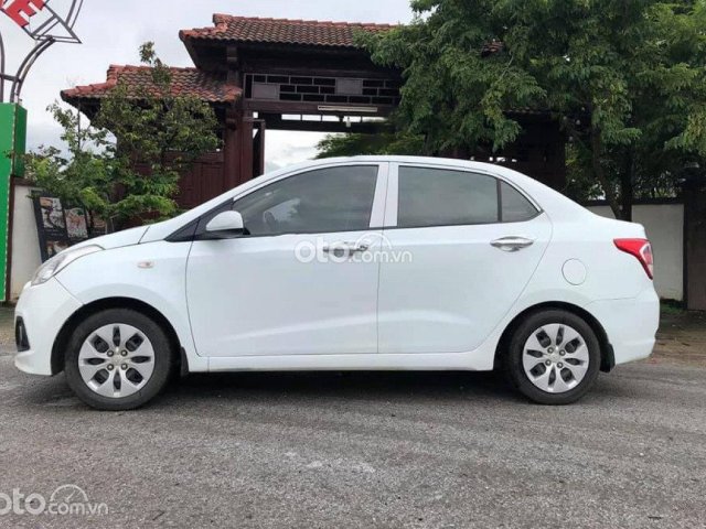 Bán xe Hyundai Grand i10 1.2 MT Base 2015, màu trắng, nhập khẩu nguyên chiếc0