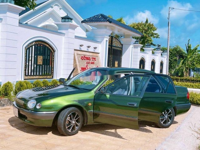 Cần bán gấp Toyota Corolla đời 1998, xe nhập, màu xanh0