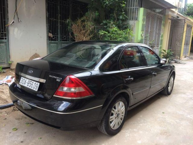 Cần bán gấp Ford Mondeo 2.5 AT 2004, màu đen xe gia đình0