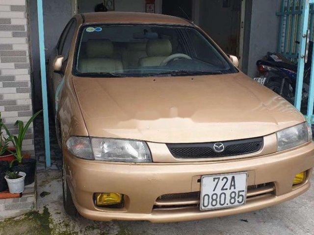 Xe Mazda 323 đời 2000, màu nâu còn mới