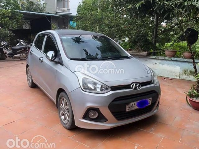 Cần bán Hyundai Grand i10 1.0 MT sản xuất năm 2015, màu bạc, nhập khẩu số sàn, giá tốt0