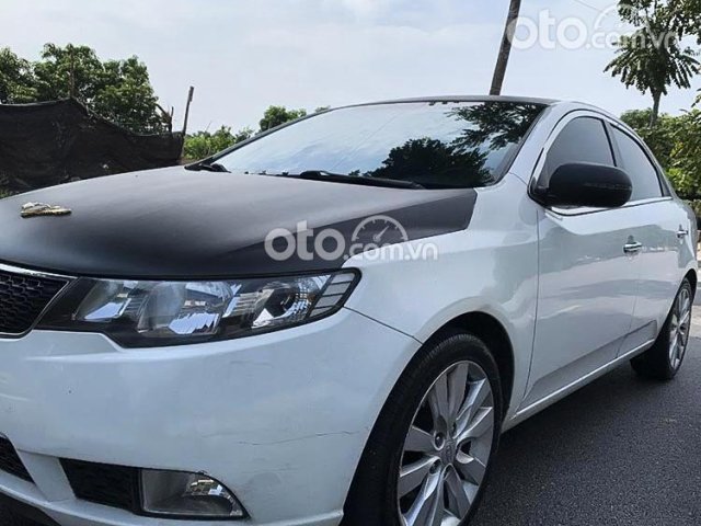 Bán xe Kia Cerato 1.6AT đời 2010, màu trắng, nhập khẩu nguyên chiếc số tự động giá cạnh tranh0