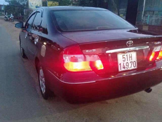 Cần bán lại xe Toyota Camry năm sản xuất 2003, màu đen giá cạnh tranh0