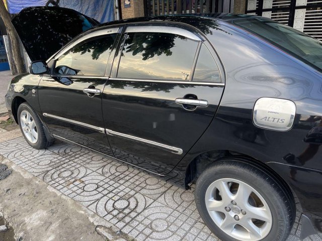 Bán Toyota Corolla Altis đời 2006, màu đen0