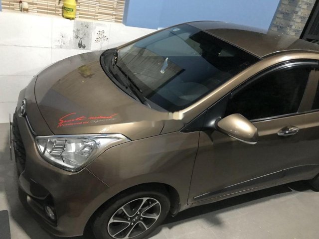 Bán Hyundai Grand i10 sản xuất năm 2018, màu nâu, 310 triệu0