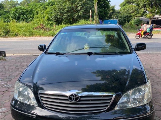 Xe Toyota Camry 2.4G năm sản xuất 2003, màu đen giá cạnh tranh0