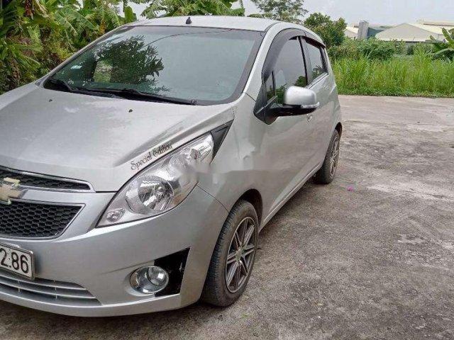 Bán Chevrolet Spark đời 2012, màu bạc giá cạnh tranh0